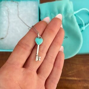 Tiffany & Co. Silver Key Pendant with Aqua Heart